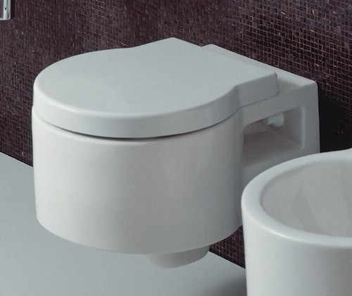 Larger image of Flame Wall Hung Toilet Pan With Seat And Cover.