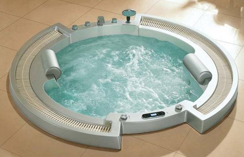 Example image of Hydra Large Sunken Whirlpool Bath With Head Rests. 2100x1950.