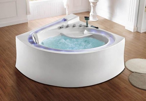 Example image of Hydra Corner Designer Whirlpool Bath With Bath Panel. 1500x1500.