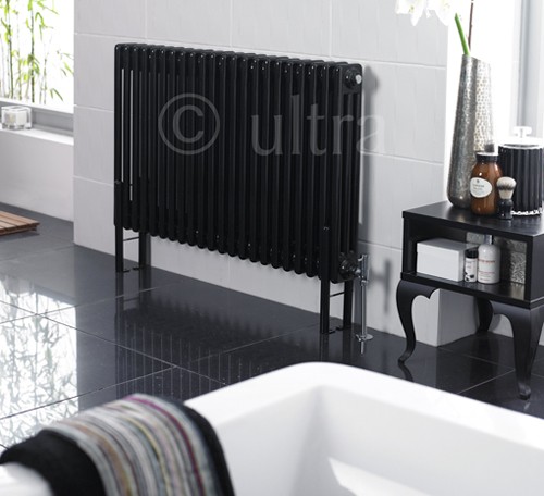 Example image of Hudson Reed Colosseum Triple Column Radiator With Legs (Black). 1011x600mm.