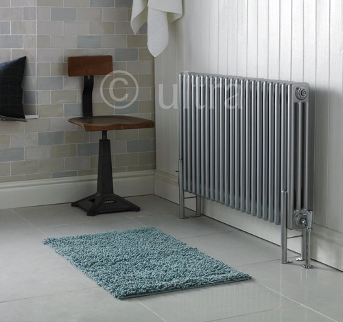 Example image of Hudson Reed Colosseum Triple Column Radiator With Legs (Silver). 1011x600mm.