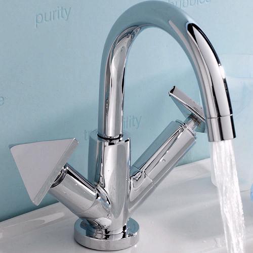 Example image of Ultra Isla Mono basin mixer with small spout and pop up waste.