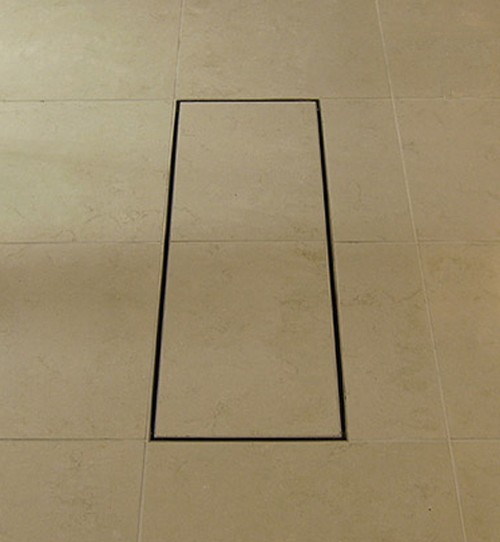 Example image of Waterworld Stainless Steel Wetroom Tile Channel With Side Outlet. 1020mm.