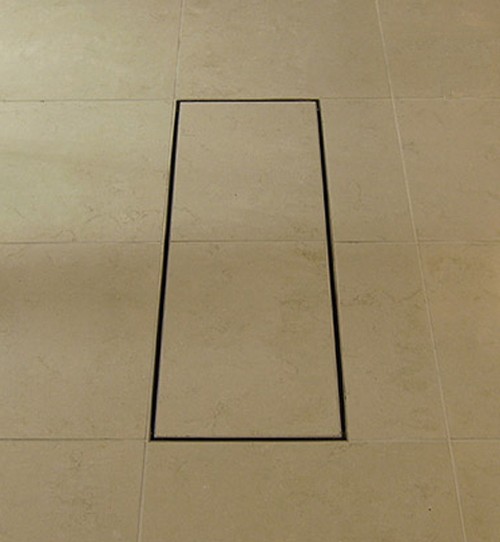 Example image of Waterworld Stainless Steel Wetroom Tile Channel With Side Outlet. 815mm.
